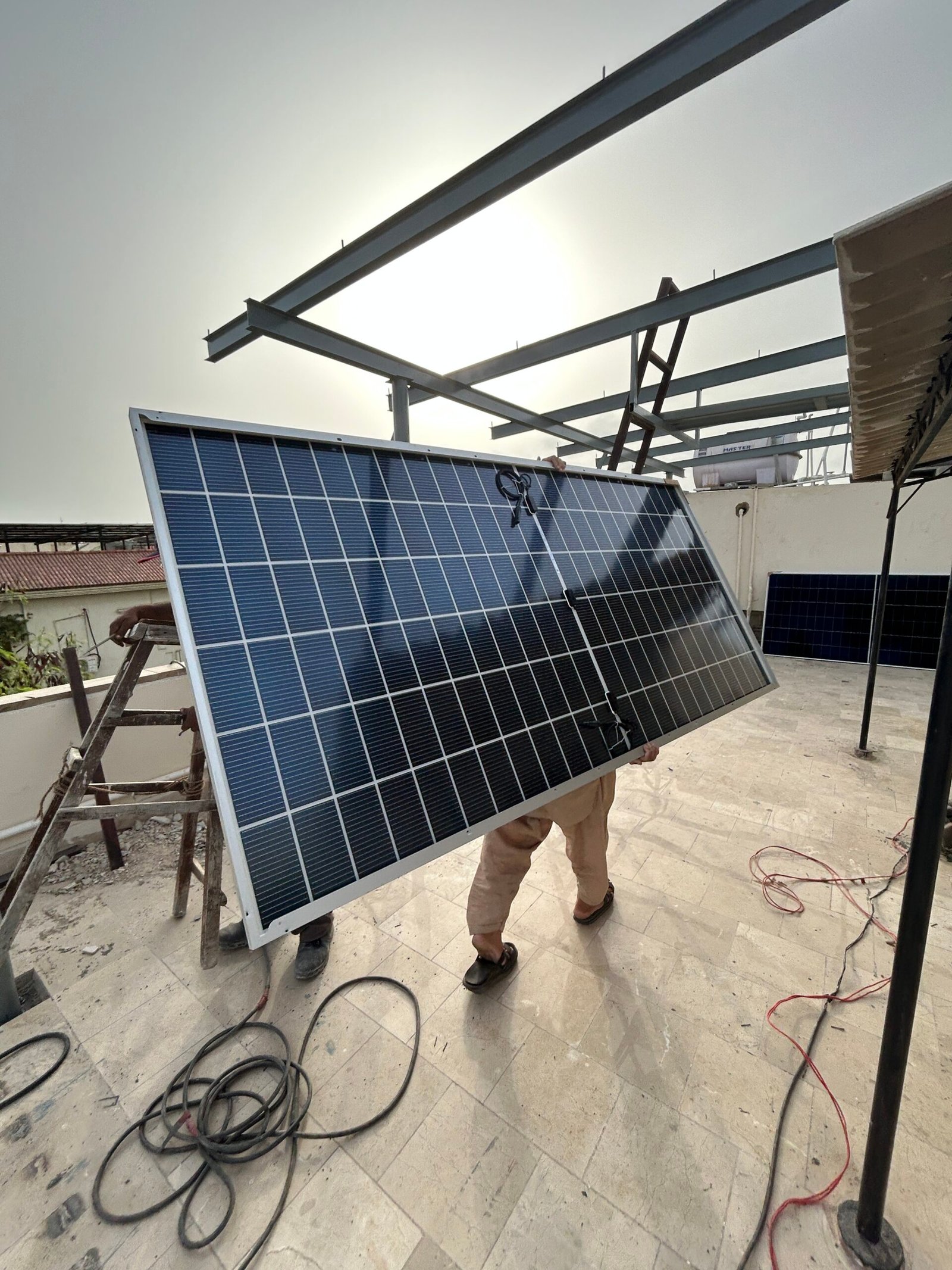 A&Z Solar Energy technician fixing a mounting structure for a home solar system